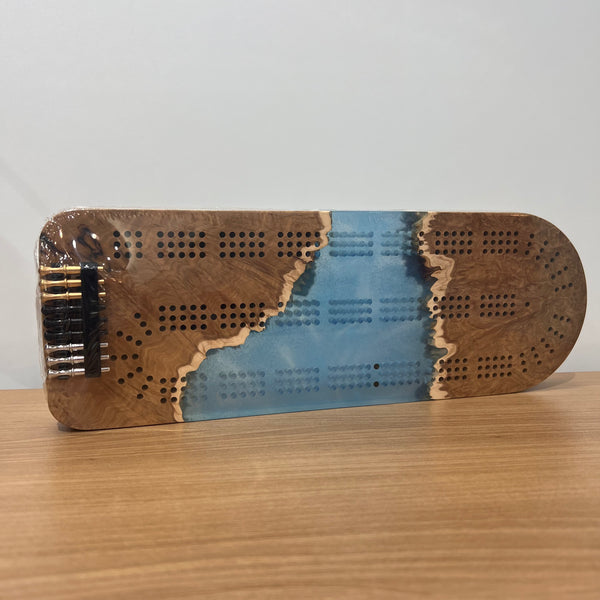 Epoxy and burl cribbage board