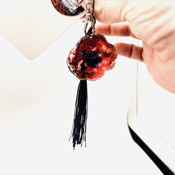 A Scarlet Tribute Car Accessory and Poppy Pin