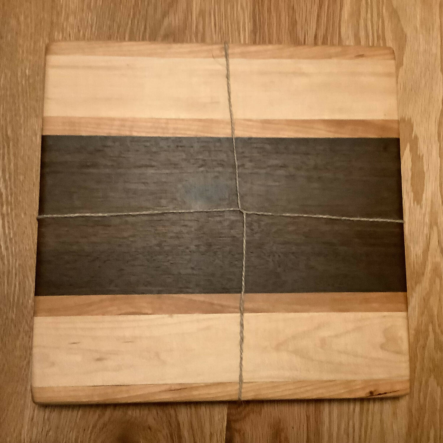 12” x 12” cutting board, walnut with cherry and maple stripes