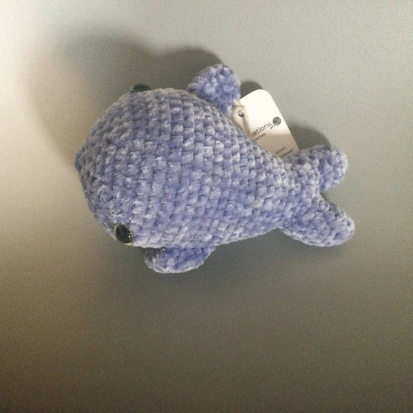 Neon green whale plushie